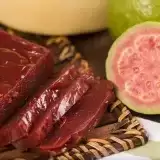 Aerial view of Sliced Guava Cheese with guava on side
