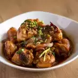 Front view of Trinidad Stew Chicken in white bowl