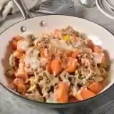 Ground Turkey Sweet Potato in a Skillet with spatula on the side