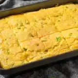 Front view of Jiffy Jalapeno Cornbread in pan on top of a towel