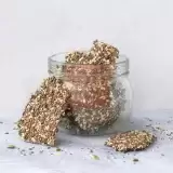 Front shot of Keto Seed Crackers in a glass bottle