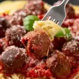 Close up chot of Vegan Meatballs on top of Pasta