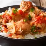 Front close up shot of Chicken Creole in a ceramic pot
