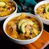 Front shot of 3 bowls of Chicken Avocado Lime Soup