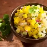 Front close up shot of Mango pineapple salsa in a bowl
