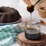 Trinidad Style Browning Sauce dripping from a spoon