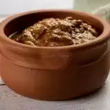 Homemade Jamaican Jerk Sauce in a cute clay jar