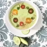Overview of avocado soup in a bowl on a tabletop