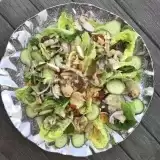 Overview of a platter of shawarma chicken salad on a tabletop 