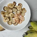 Air Fried Banana on a plate cut into small round piece